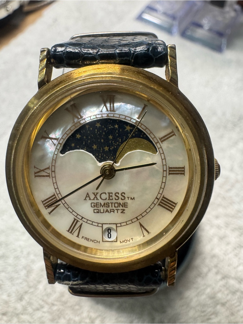 Axcess Gold-Tone Moonphase Watch with Black Strap